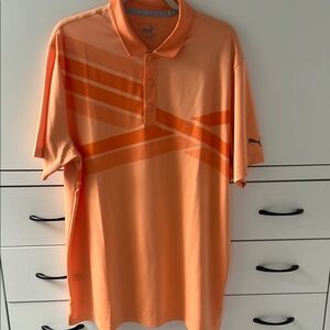 Puma Orange Polo Shirt with Geometric Design